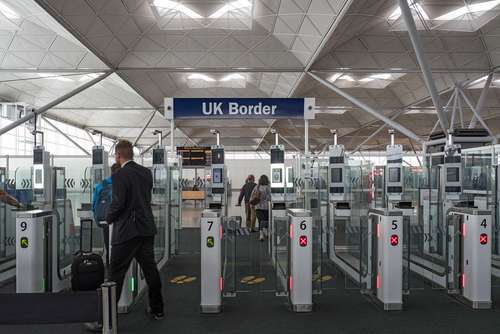 “UK immigration area at London Heathrow Airport – border control signage”
